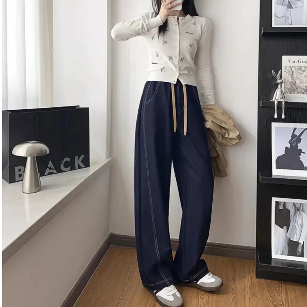 奕~美腿裤韩单东大门新款美腿线香蕉牛仔裤66167