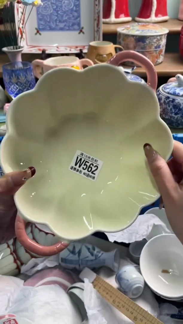 陶瓷郑**?W562*******