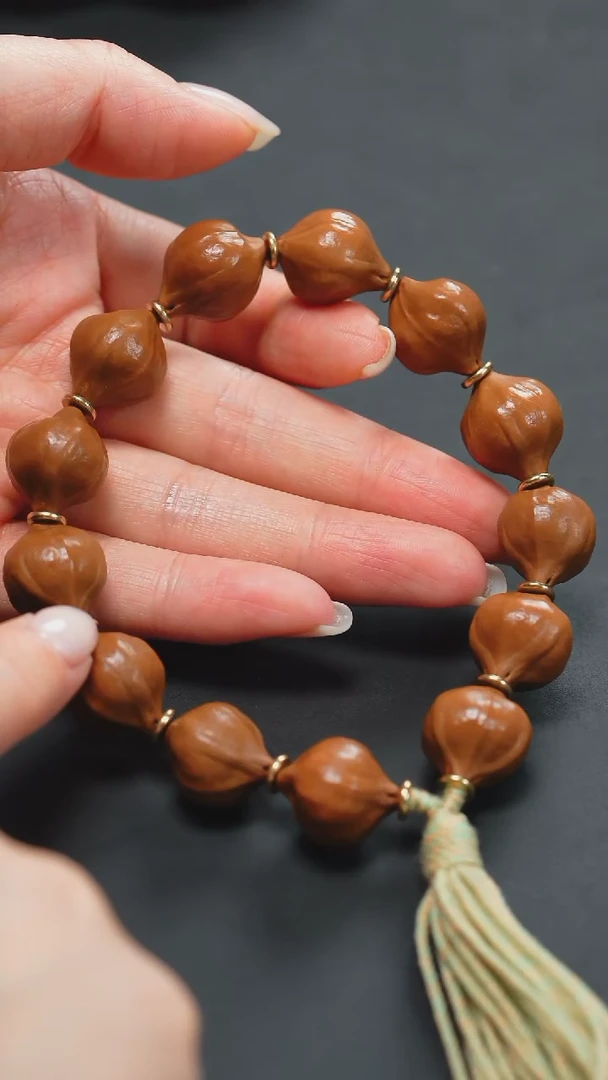 橄榄核手串小籽素串蜜桃臀