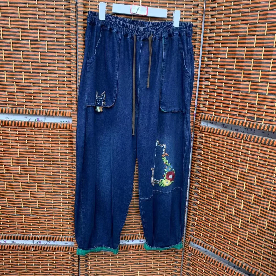 妈妈时尚休闲松紧腰加大加肥大弹牛仔裤复古宽松重工做旧绣花