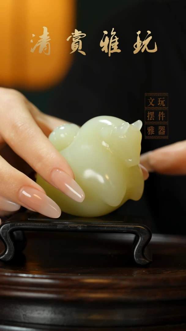 玉《牛柿在握》手把件摆件