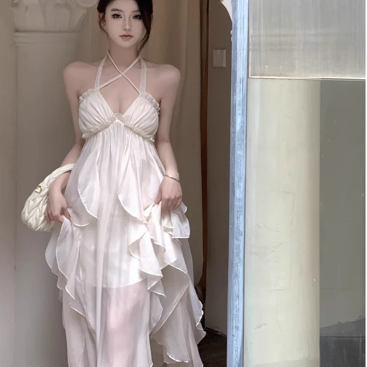 海边度假气质挂脖吊带连衣裙女夏季纯欲性感露背不规则雪纺长裙子