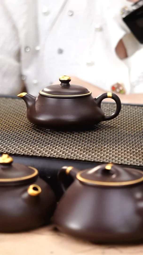 茶壶紫砂四号井茄皮紫泥描金明炉100cc