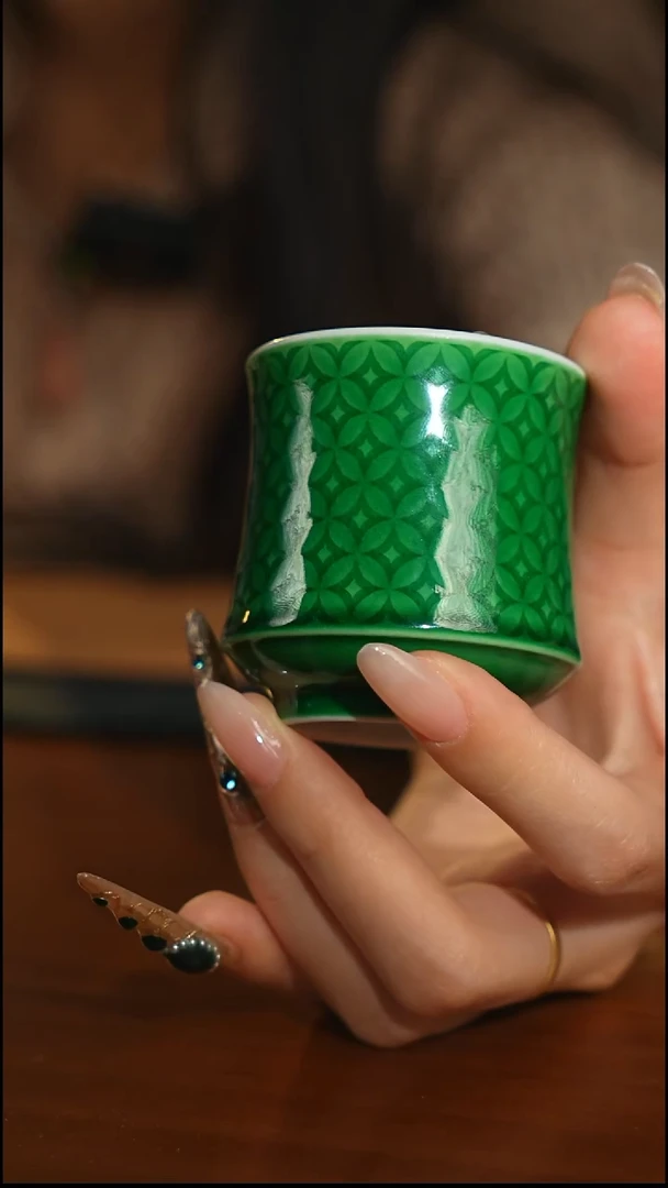 瓷片瓷唐里绿釉铜钱纹束腰马蹄杯