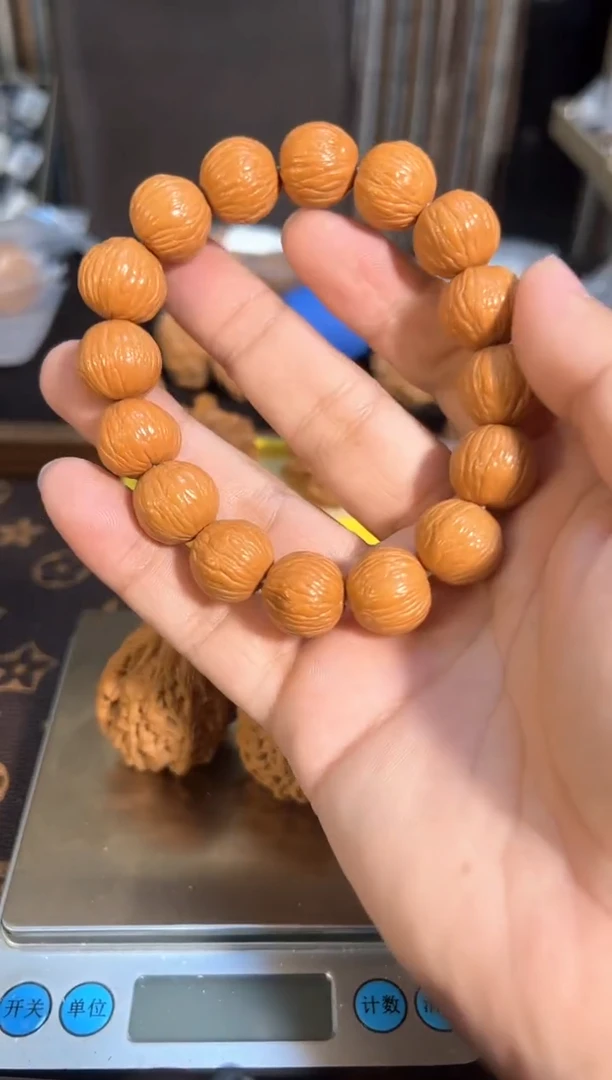 把件核桃原皮原色凤羽猴头手串