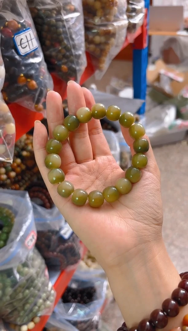 吊坠菩提根/象牙果绿色桶珠单圈手串