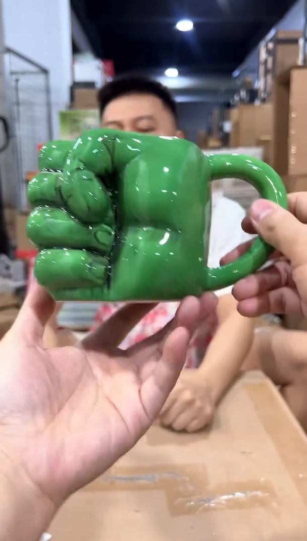 瓷片绿色拳头水杯微瑕