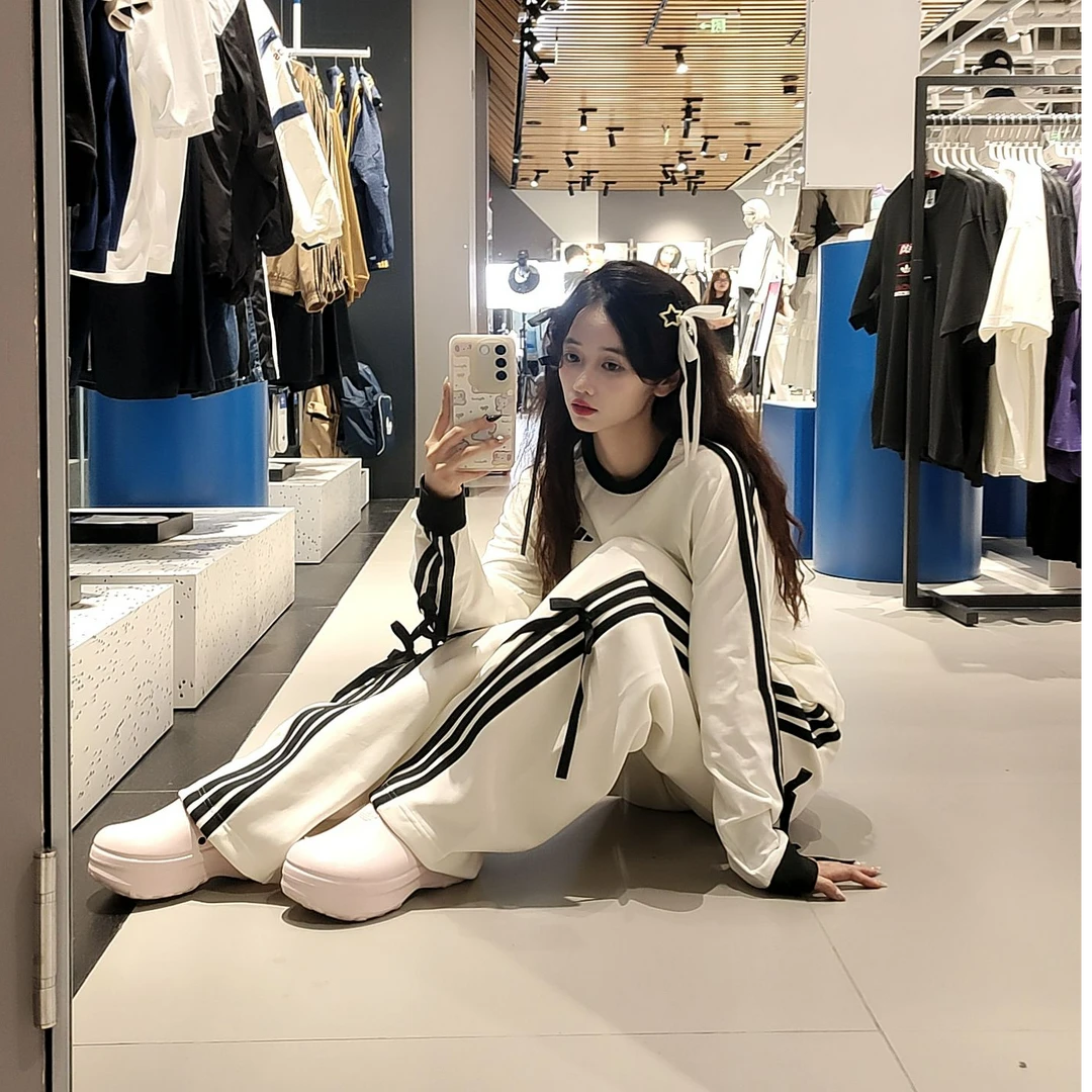 adidas/阿迪达斯女款秋冬新款宽松舒适休闲百搭扭扭裤 KG3857