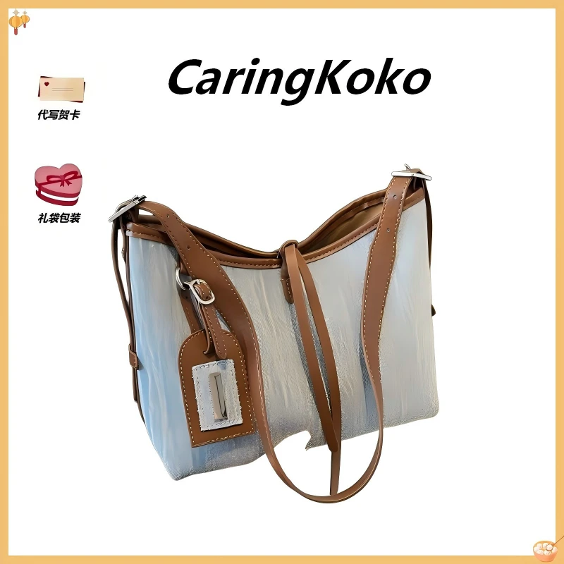 CaringKoko高级感牛仔布水桶包女新款潮流时尚单肩包小众高级女包
