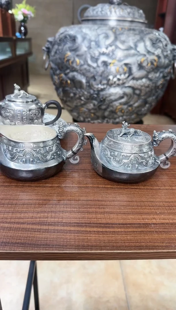 广*足银999精工手工战国饕餮纹异型熏色公道杯加泡茶壶