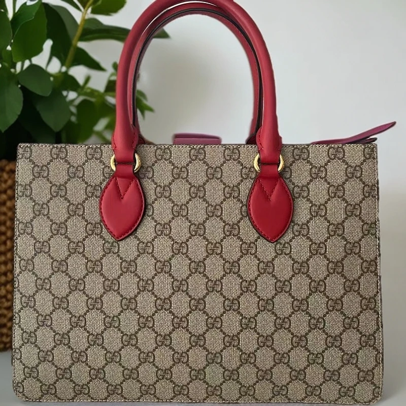 95新 GUCCI/古驰  老花拼红手提包1201 2184