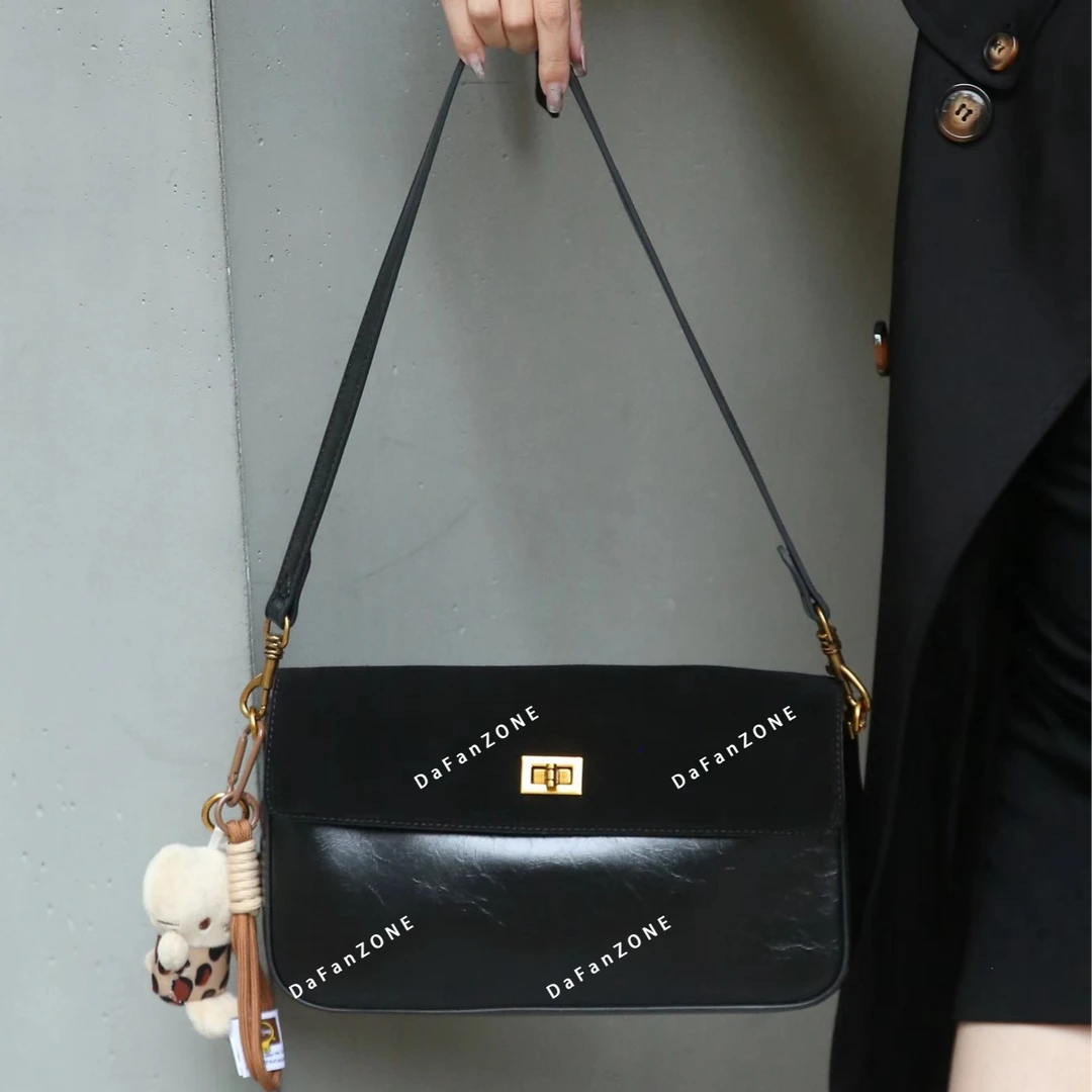 【芝麻集】SKL-G8011-黑色RAIN.CUN夏季新款腋下斜跨轻奢女包