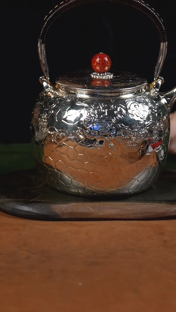 手工锤纹饕餮烧水提梁