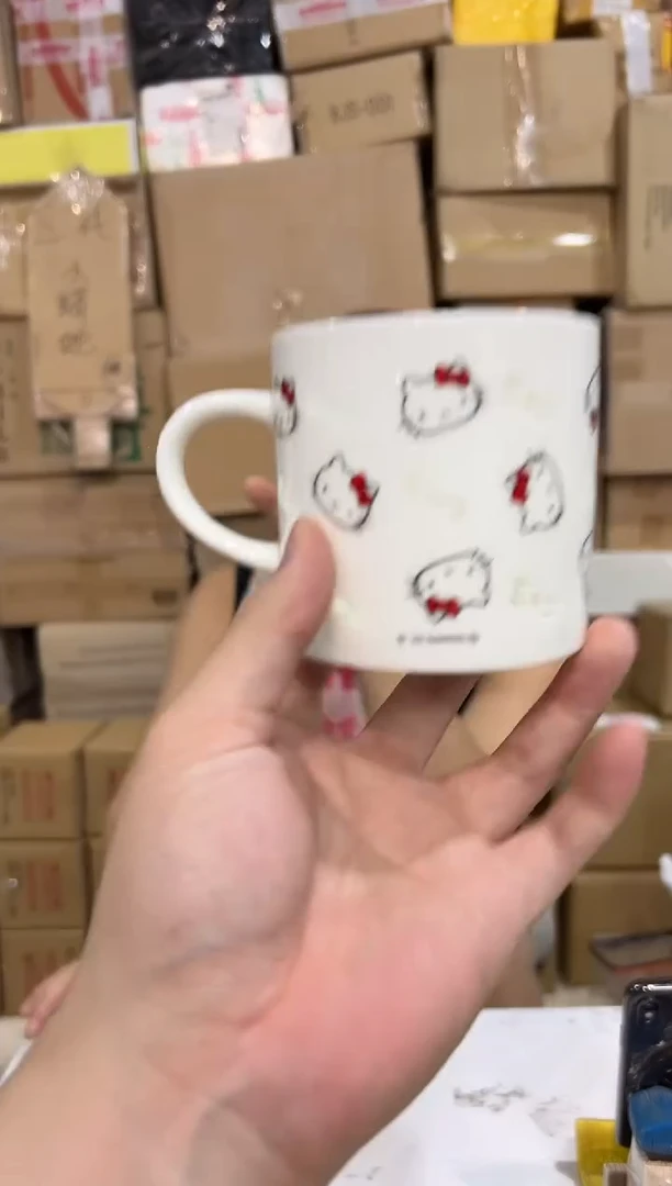 瓷片白色kt猫缕空满印水杯