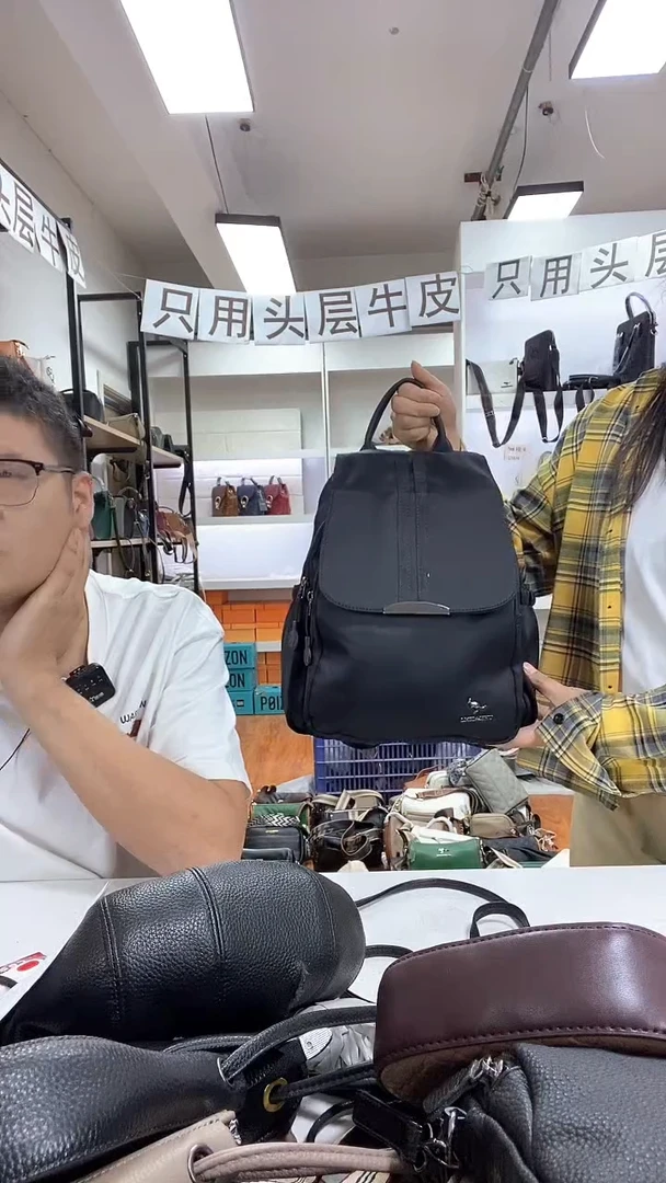 头层牛皮双肩包尼龙配真皮