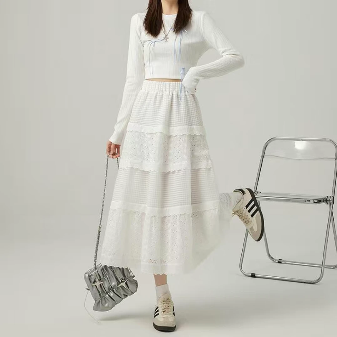 白色蛋糕裙穿搭2025新款春季温柔风设计感A字裙高腰半身裙长裙子