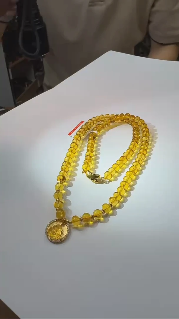 未镶嵌琥珀裸石抚顺琥珀卡6mm豆油长项链大牌设计款