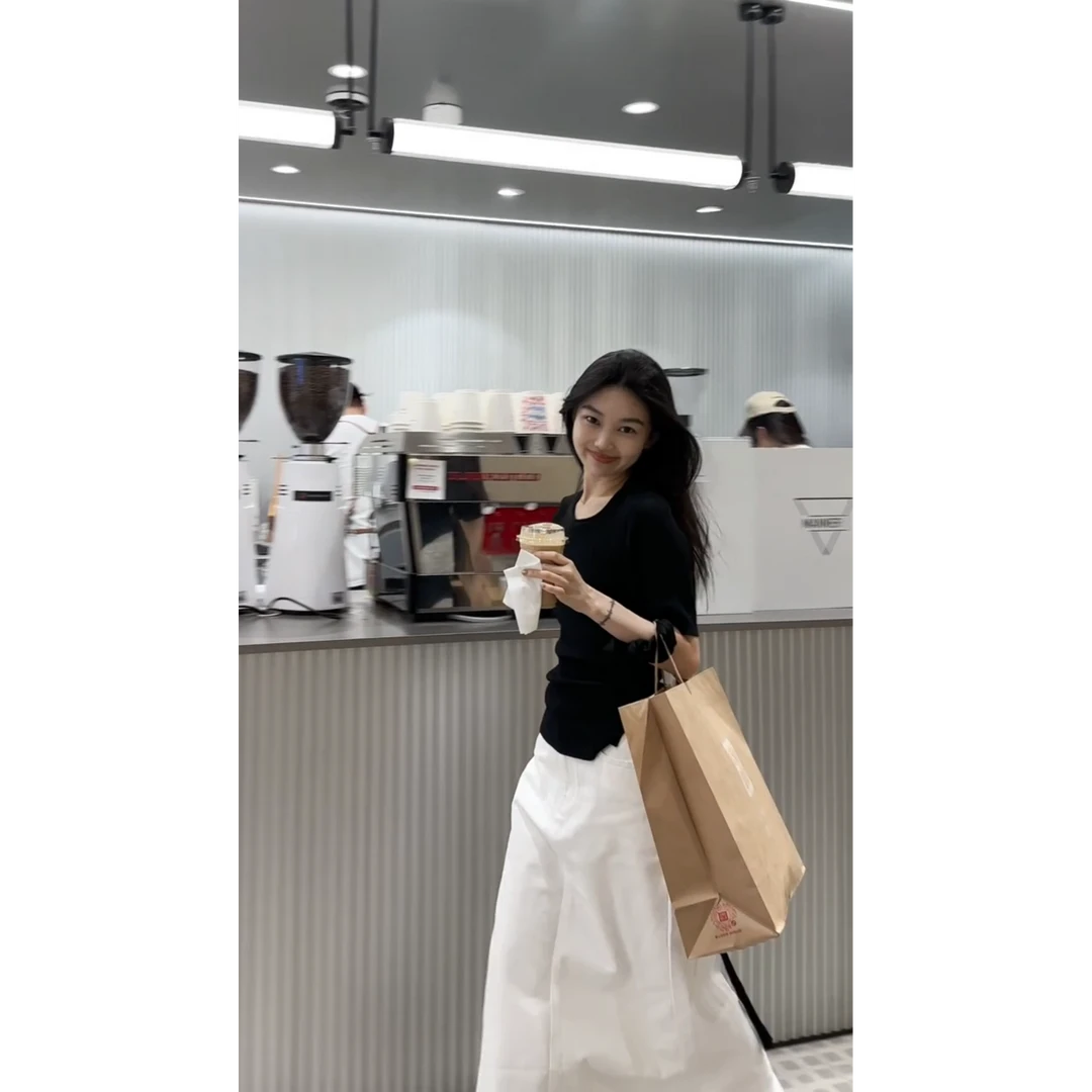 MARIE.COCO高级感女神范大方得体的黑色上衣高腰开叉半身裙两件套