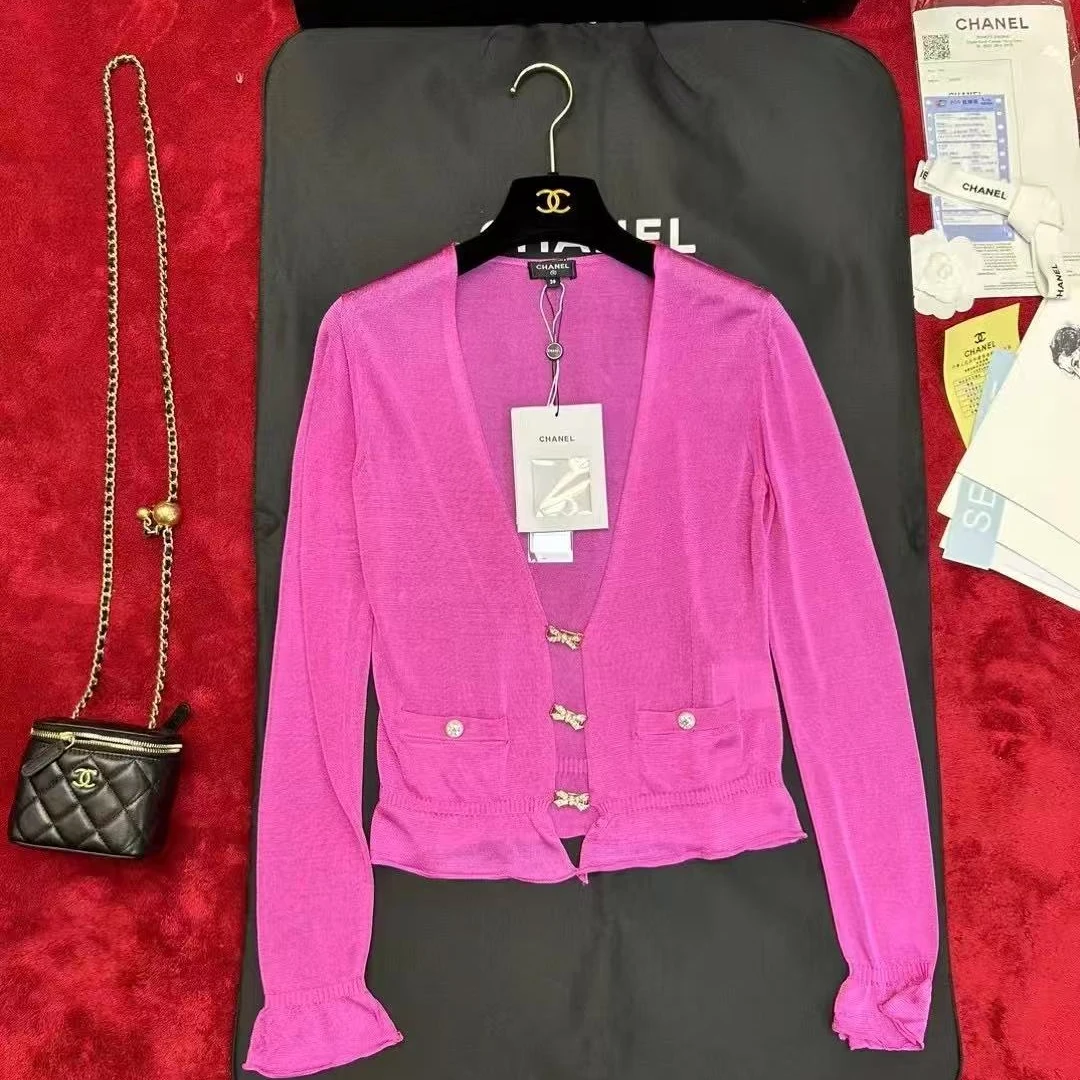 99新 Chanel/香奈儿 Chanel23 新款紫色蝴蝶结钻扣开衫38码