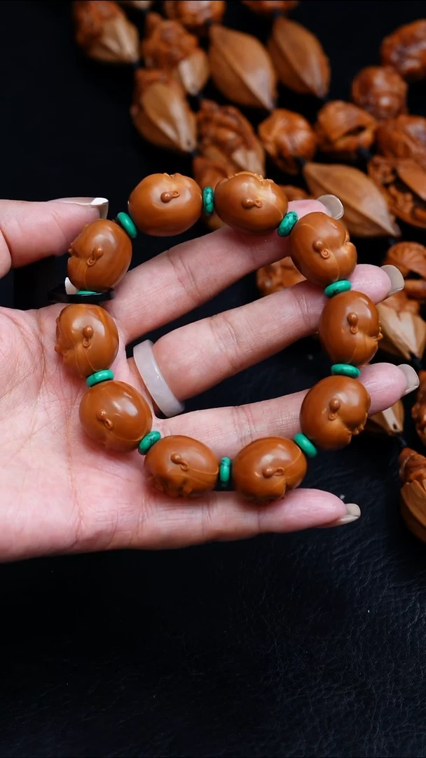 橄榄核吊坠21正圆人生百态