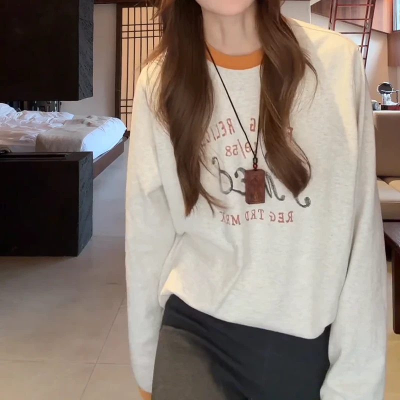 秋冬新款燕麦橙撞色字母显瘦时尚百搭长袖T恤LK2508926