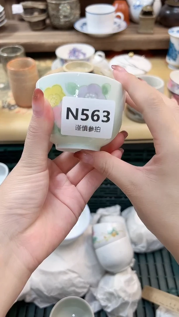 瓷片开****? 563