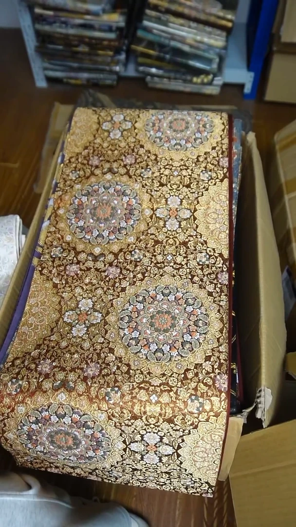 织绣细密织宝相花尾款