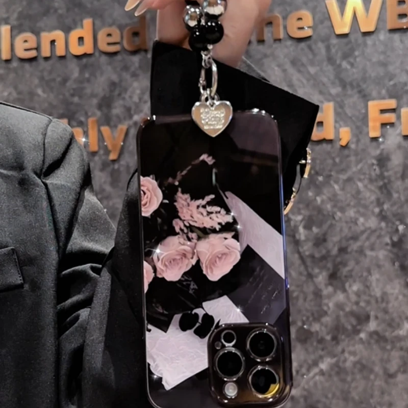 手捧玫瑰适用苹果vivo华为oppo小米iPhone17电镀玻璃防摔手机壳潮