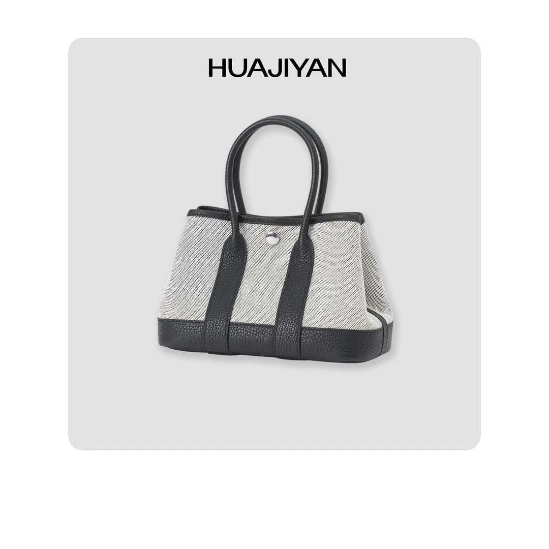 华吉言/HUAJIYAN【配饰系列】头层牛皮高密帆布撞色设计花园包