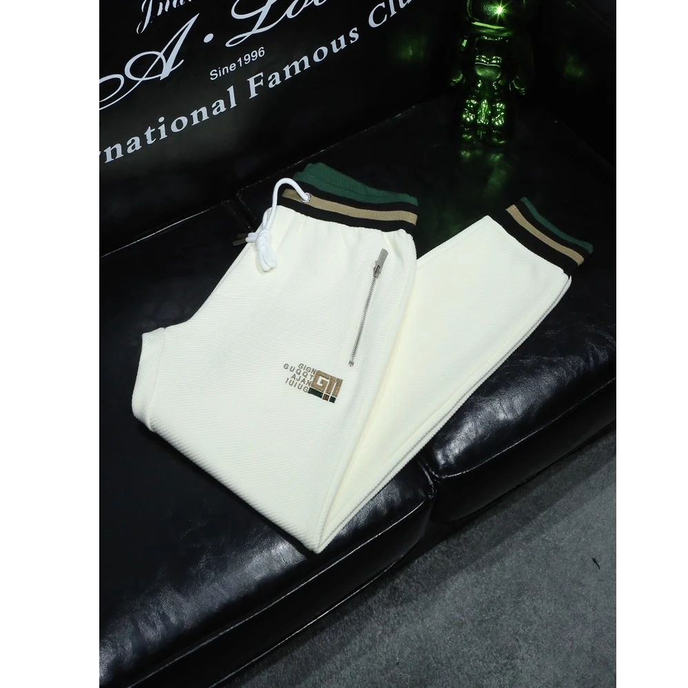 保登皮兹秋季新款休闲裤男装刺绣修身束脚长裤男口袋拉链运动裤