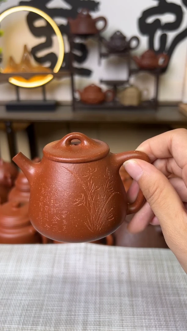 茶壶段泥红降坡高石瓢壶兰花刻150CC-甘来兵