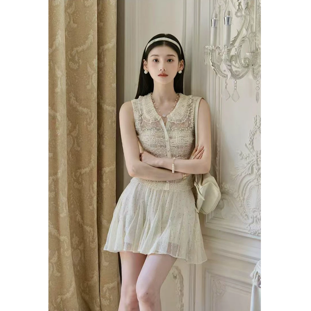 法式气质女神2025夏季新款小香风性感镂空翻领上衣配显瘦短裙套装
