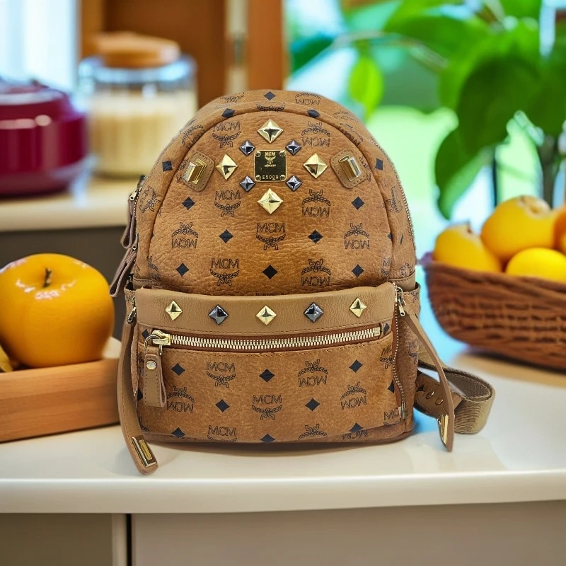 95新 MCM  干邑色双肩包  1733 1182