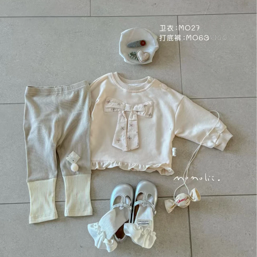 027-茉M哩蝴蝶结长袖上衣