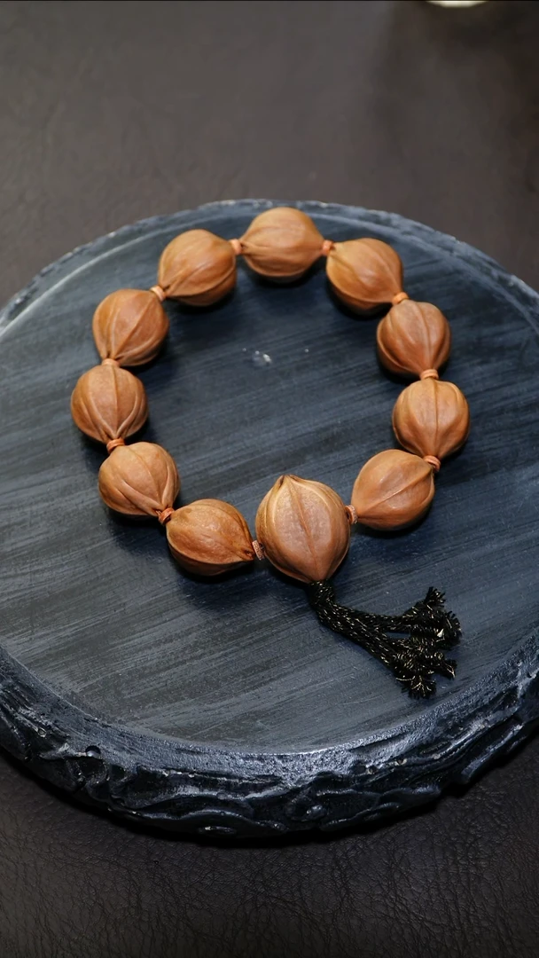 手串/手链橄榄核?****。2.1*2.6原桩老料铁核正四花+2.5四花三通