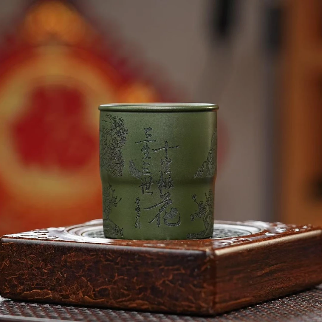 宜兴原矿紫砂绿泥刻绘十里桃花主人杯
