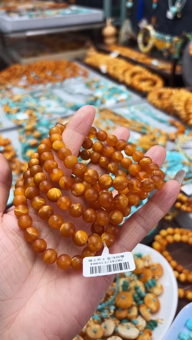 【闪购商品】琥珀裸石未镶嵌花蜡圆珠手链微瑕多样性发其中一件