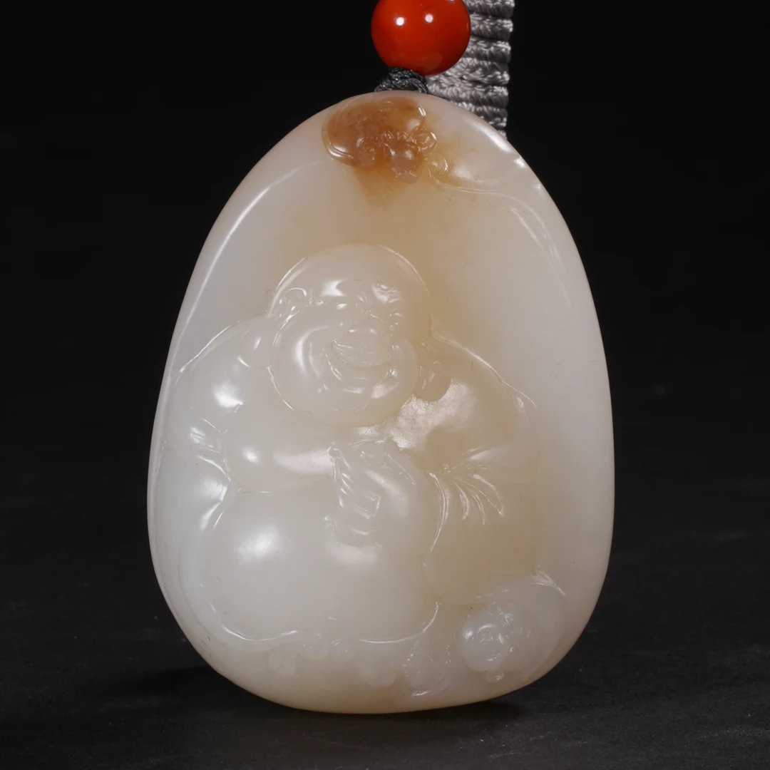 lot27新疆且末糖料弥勒笑佛挂件/保利拍卖