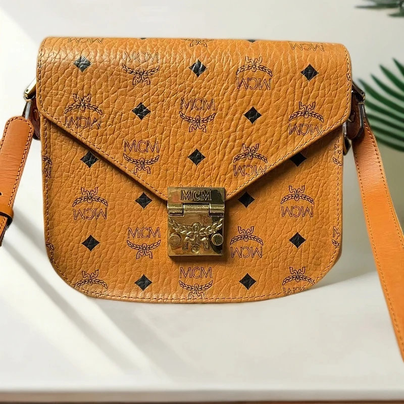 95新 MCM MCM斜跨包G25100397