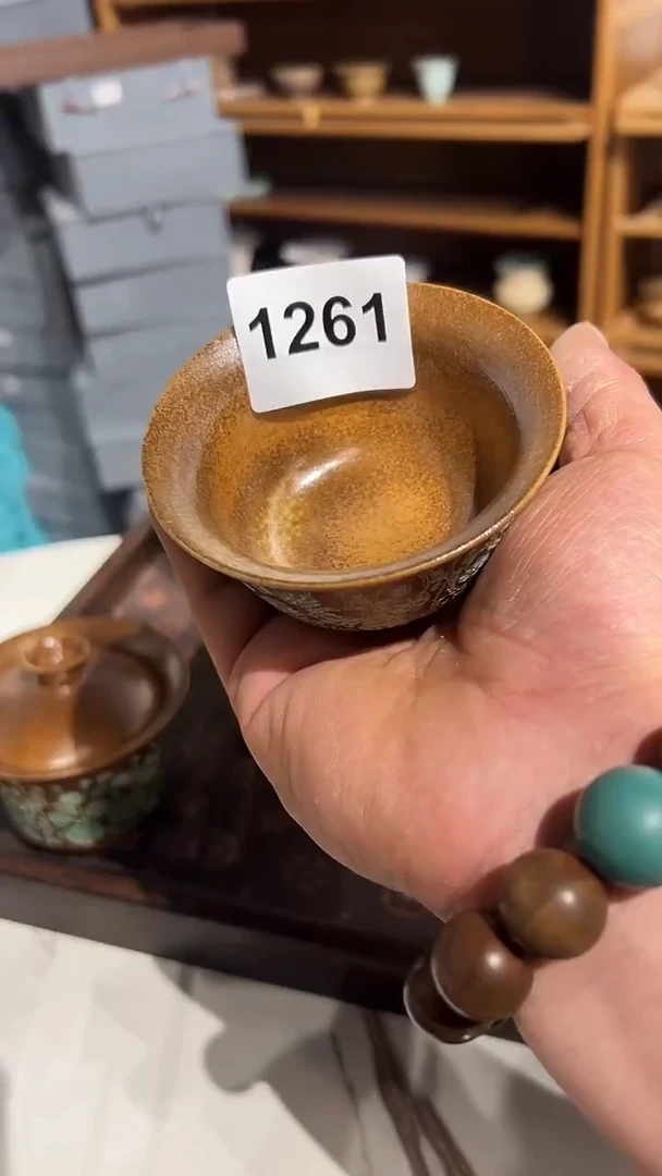 龙泉窑水草花压手杯微瑕1261