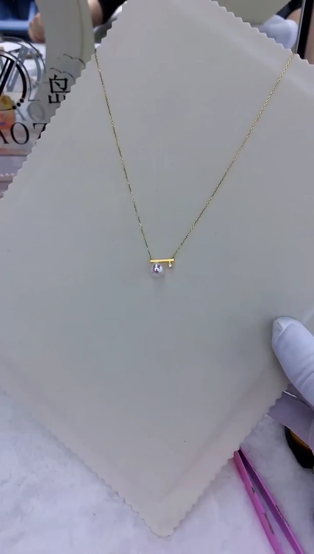 18K金镶嵌饰品海水珍珠7-8钻石音符套链