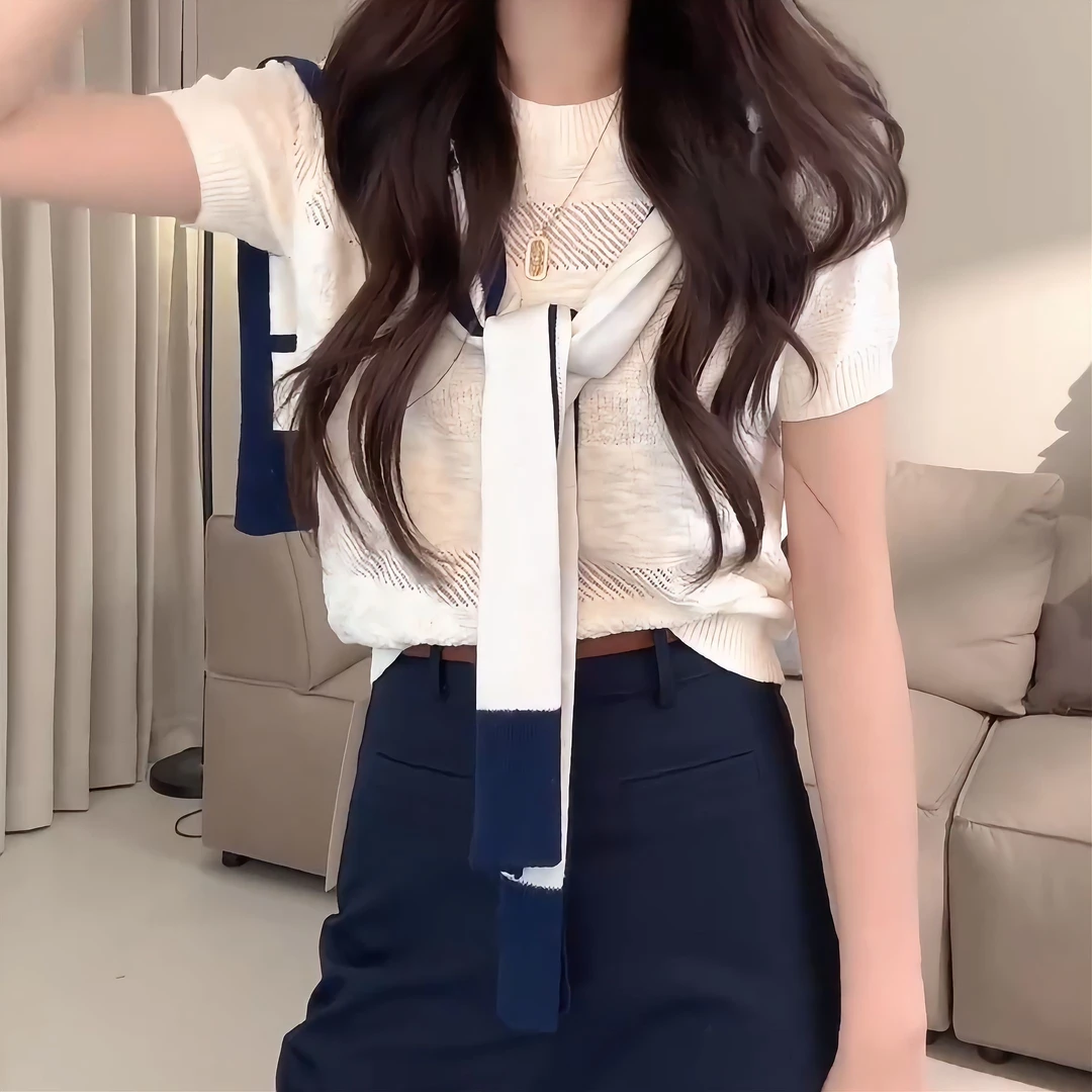 2025气质圆领提花镂空宽松休闲百搭短袖针织上衣LK2501885