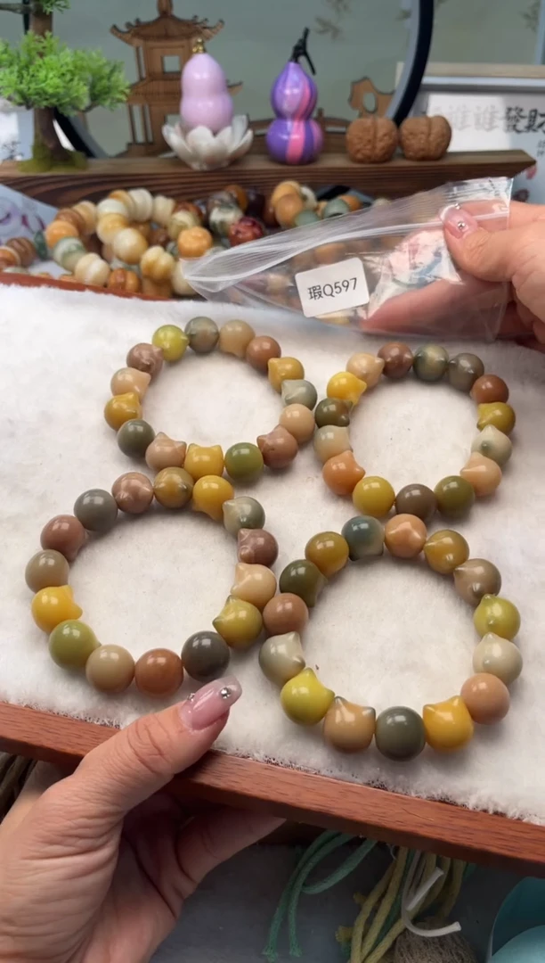 【闪购商品】菩提根/象牙果手串15+mm瑕猫头随机一串不挑Q597
