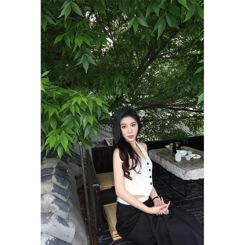 春夏新款甜美可爱高级单排扣马甲背心时尚小众垂感拼接阔腿裤