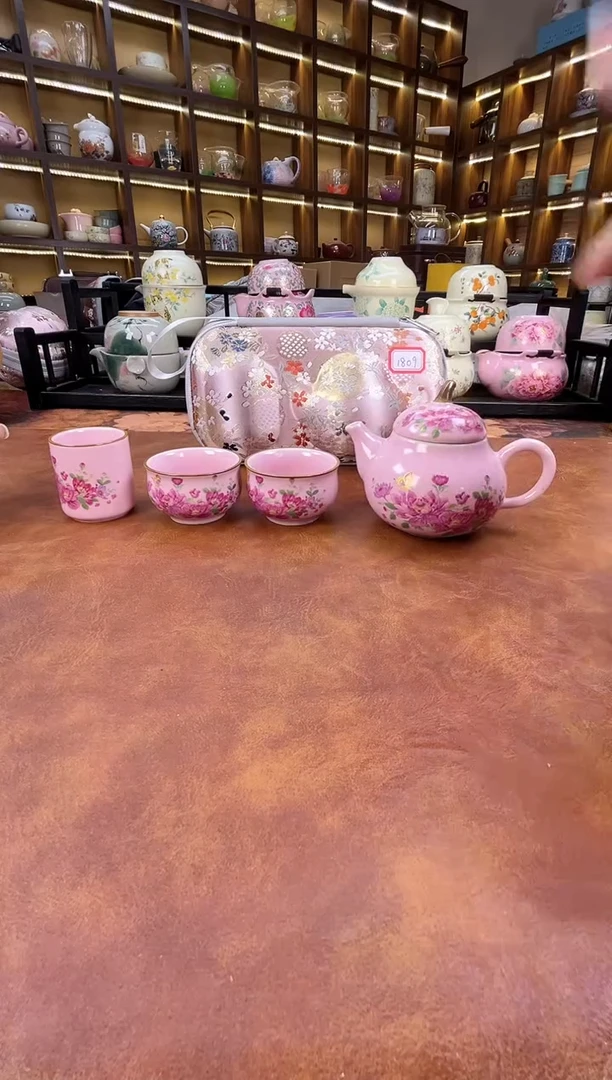 瓷片粉色梨形手把壶旅行