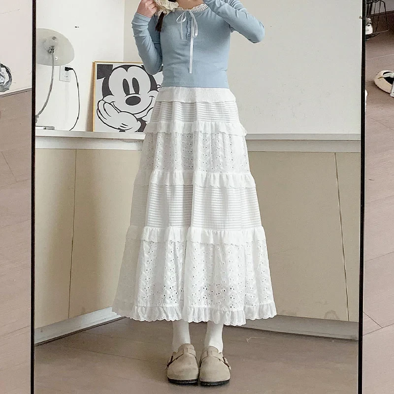 白色蛋糕裙穿搭2025新款春季温柔风设计感A字裙高腰半身裙长裙子