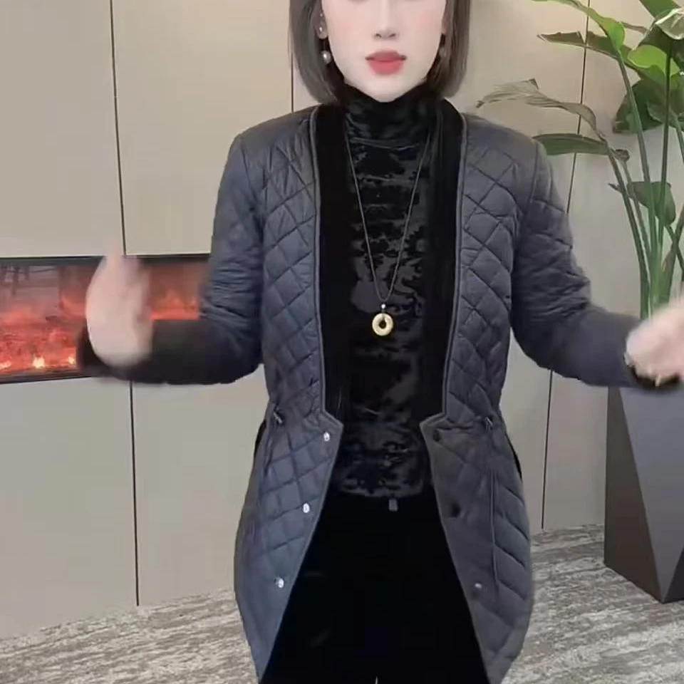 黑色时尚休闲百搭中长款棉服女2025冬季新款显瘦遮肉高级感棉袄潮