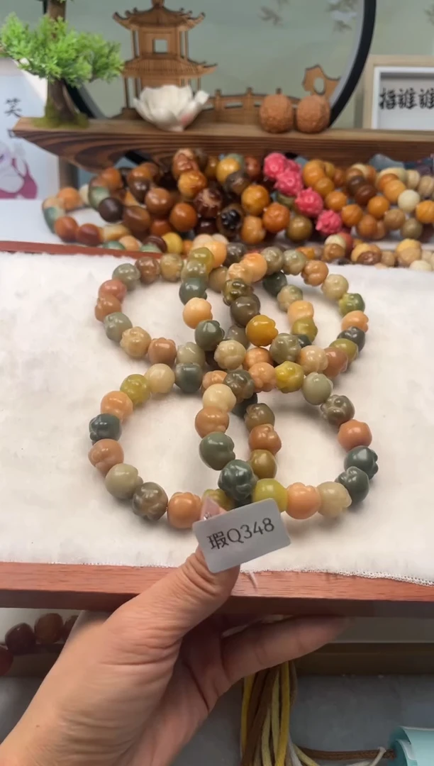 【闪购商品】菩提根/象牙果手串14-15mm瑕爱心猫爪随机一串Q348