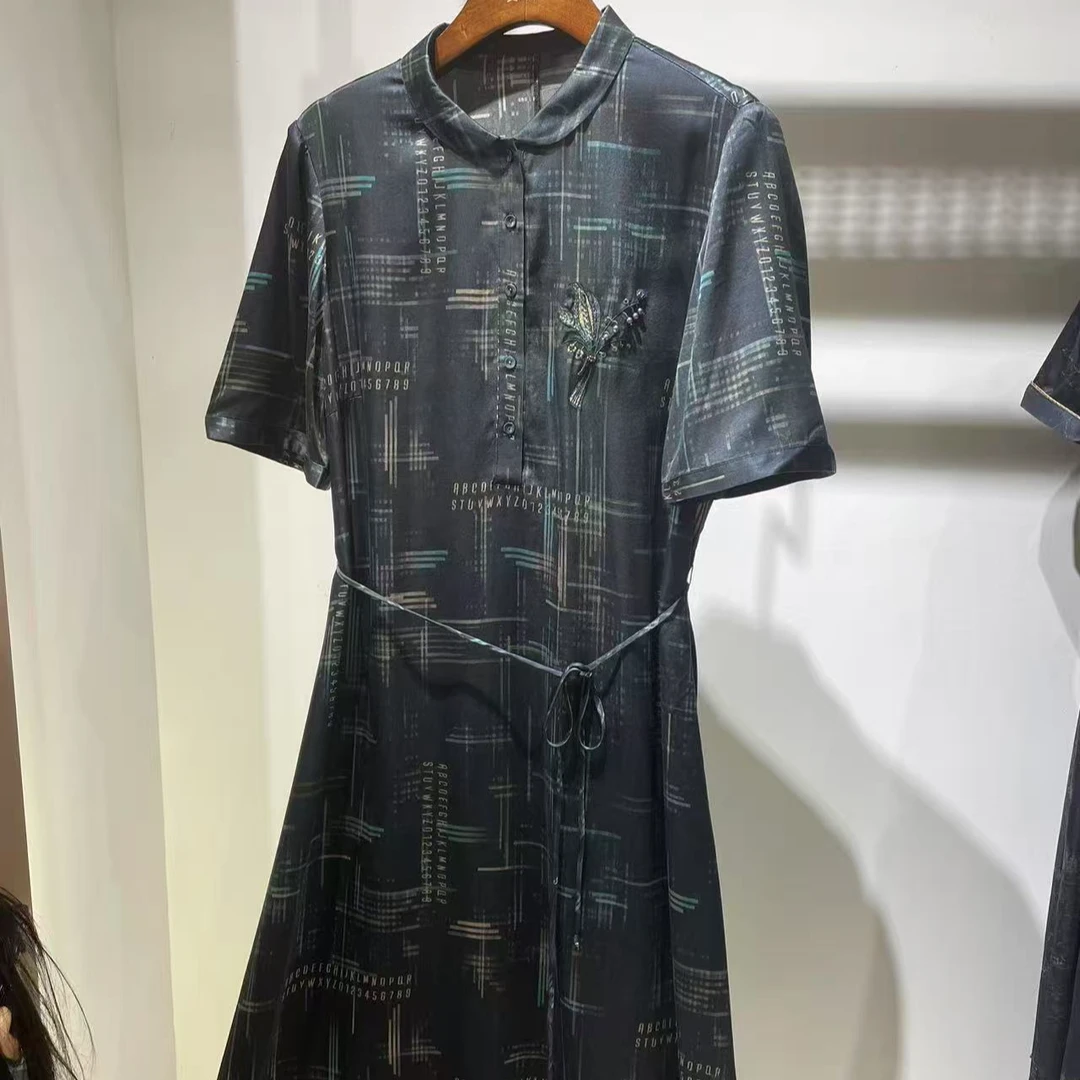 艾玛萨头印花春季圆领单排多扣连衣裙NKY-281057