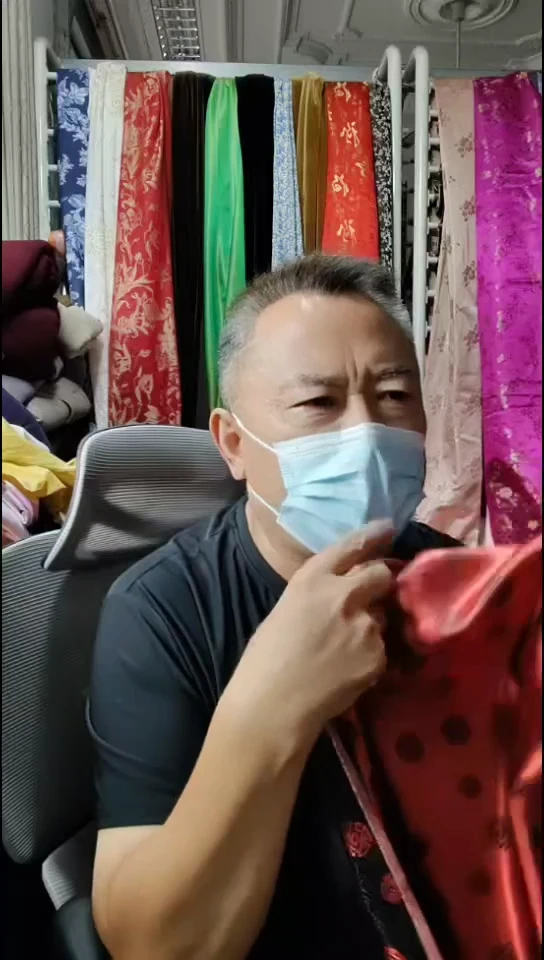 黑红小团圆花织锦缎布料